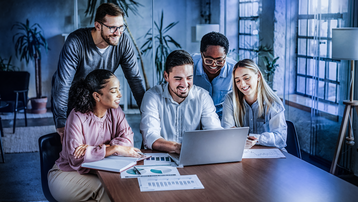 young business people meeting office teamwork group laptop presentation seminar businesswoman startup creative training businessman leader student education teaching coach brainstorming computer technology